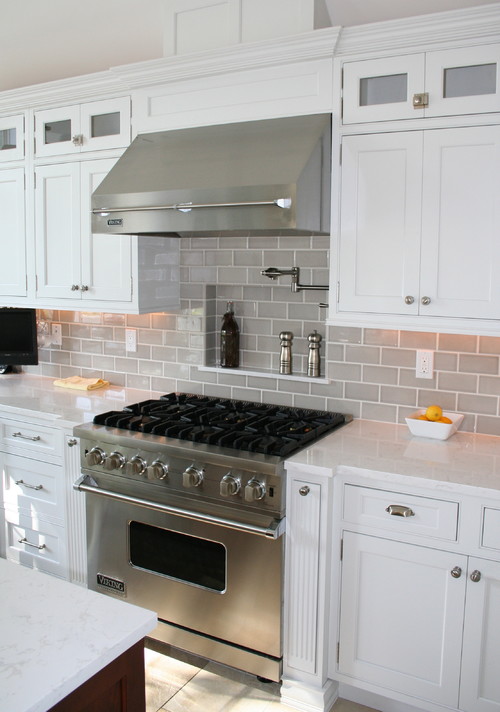 Cambria Torquay Countertop and Cambria Torquay Island Top with White Cabinets and Ceramic Subway Tile